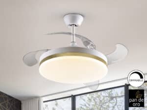 White and gold ceiling fan. Band of gold leaf around the fan, pictured on a ceiling