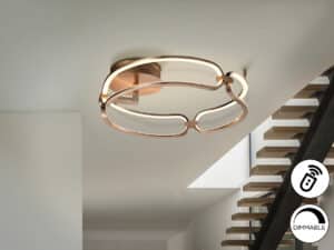 rose gold led ceiling light sown beside some oak stairs