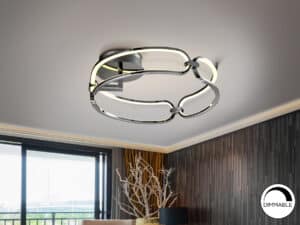 small led ceiling light in chrome displayed in a room painted brown
