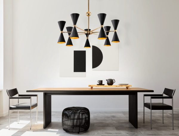 lighting trends 2025 black and gold pendant